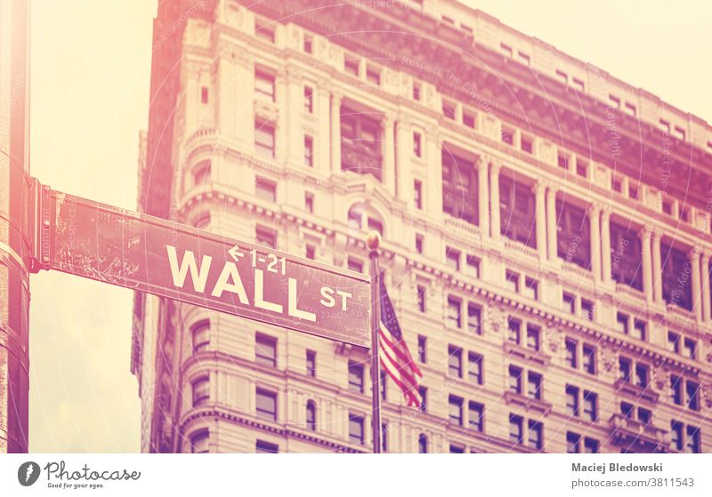 Retro stylized picture of Wall Street, New York, USA. street sign city retro vintage symbol building America NYC business Manhattan financial district famous