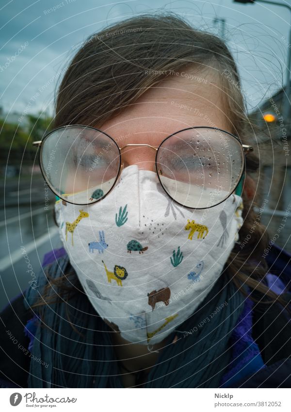 young woman wearing a mask and fogged glasses in autumn / winter (Corona / Covid-19) Young woman Mask Mask obligation Hygiene regulation covid-19 COVID