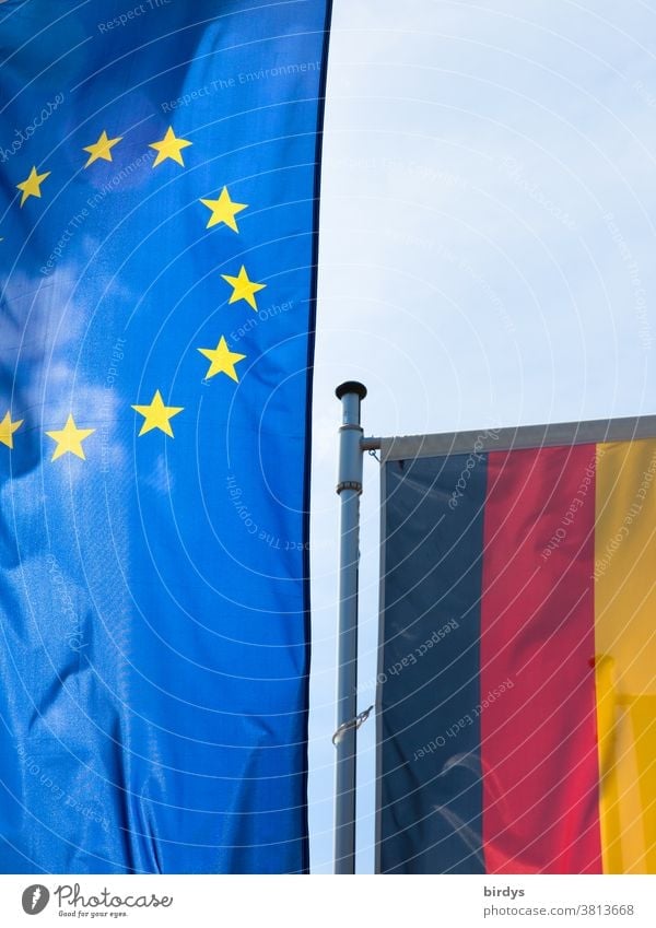 European flag in the foreground and German flag in the background EU European Union Flags and banners brd Member State Politics and state Federalism Germany