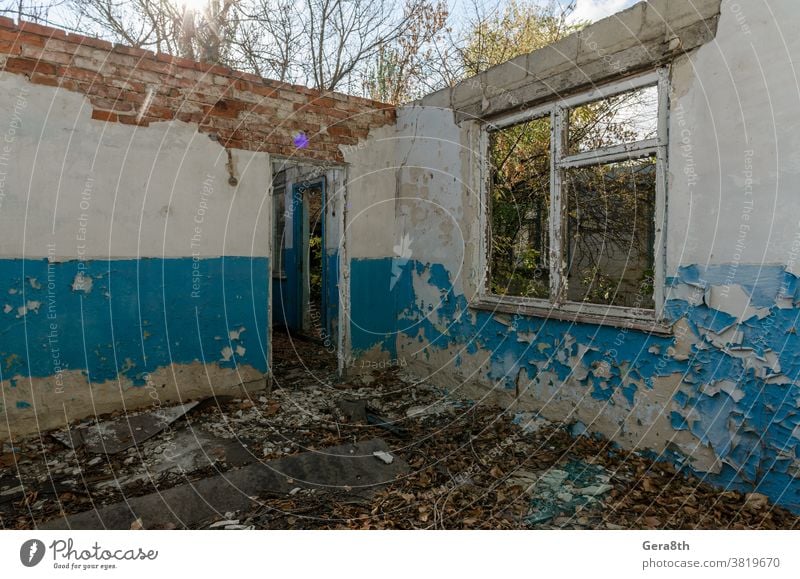 ruins of an old abandoned village house in Ukraine abandoned house architecture autumn blue building conflict country house crisis day derelict desert desolate