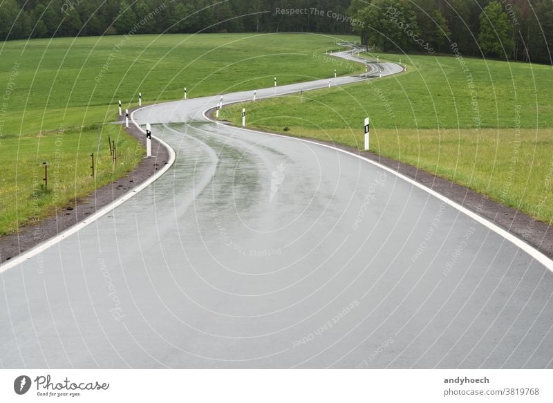 Curvy country road on the edge of the forest adventure asphalt Background backgrounds bad copy space countryside curve curves danger dangerous difficult