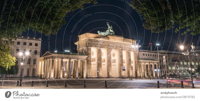 Brandenburg Gate at night with a treetop as a frame architecture attraction Berlin brandenburg brandenburger building built structure capital city city gate
