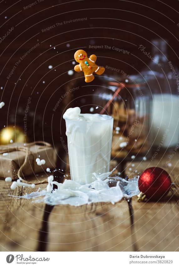 Gingerbread man and a glass of milk. Christmas concept sweet food gingerbread festive xmas candy drink christmas cookie december holiday celebration decoration
