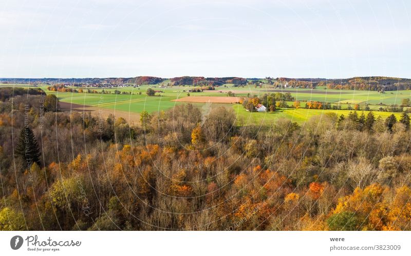 View from above on the autumnally coloured foliage of the Wertachauen near Hiltenfingen Flight area Autumn panorama view Aerial photograph pretty