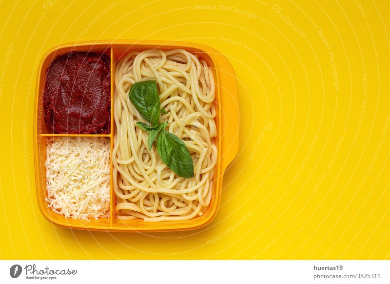 Healthy Food in Plastic containers ready to eat with spaghetti with tomato, cheese and basil food plastic healthy food to take away fried tomato italian