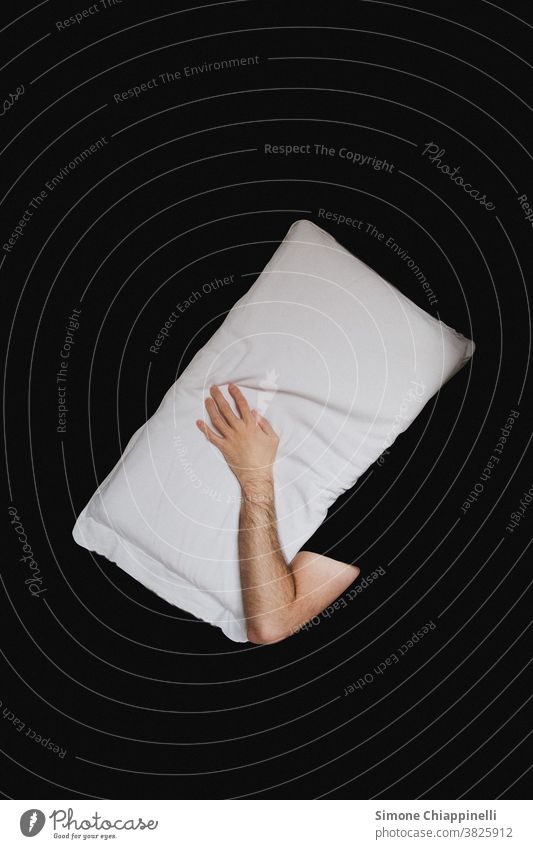 Sleeping with pillow on your head on a black background Black Pillow Abstract conceptually white pillow Bed Cushion Dream White Calm