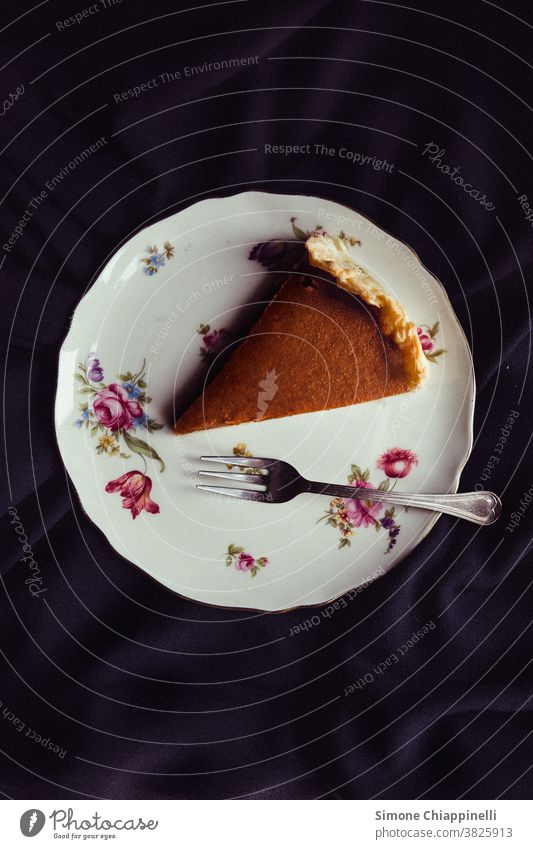 Slice of pumpkin pie on a dish Food Food photograph Dish Plate Healthy Eating Delicious Vegetarian diet Pumpkin Studio shot Fork Autumn Diet Vegetable