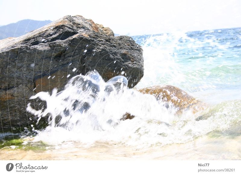 Rock in the surf Waves Ocean Refreshment Vacation & Travel Nature