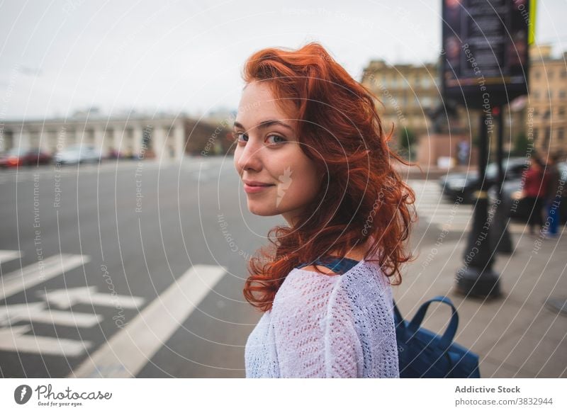 Redhead woman on street in city crosswalk red hair redhead road traffic appearance town female saint petersburg russia russian federation style trendy casual
