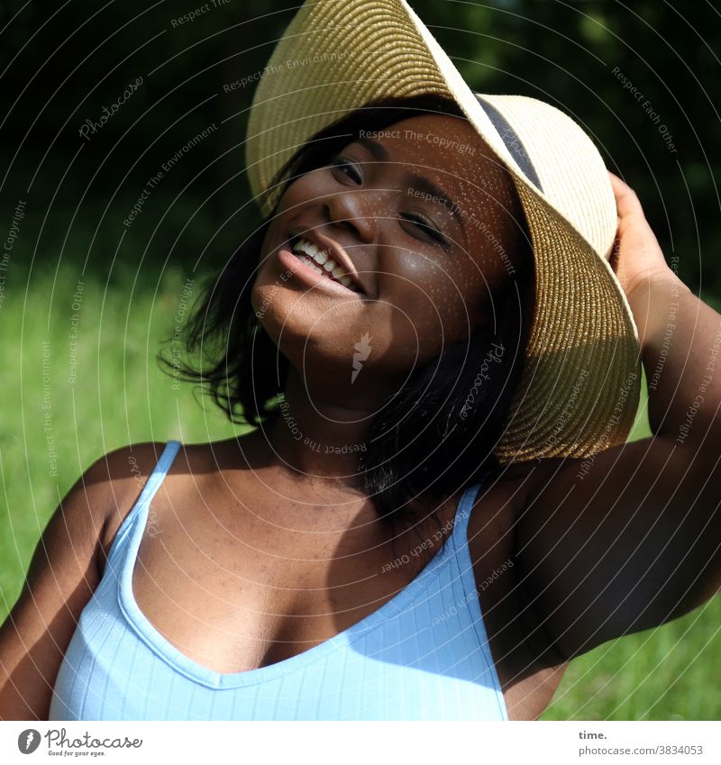 laughing woman with straw hat Woman Hat Black-haired T-shirt sunny Summer Shadow Laughter Smiling Good mood cheerful Straw hat