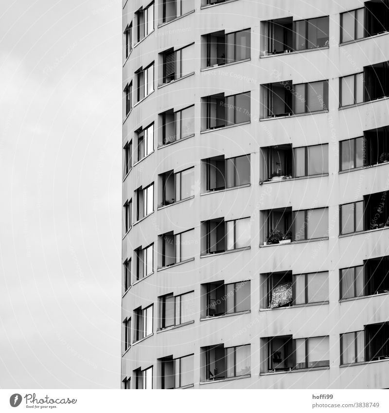 Spiral-shaped windows and balconies wind their way up the dismal façade spirally Window Balcony Facade Glazed facade dreariness dwell block of flats High-rise