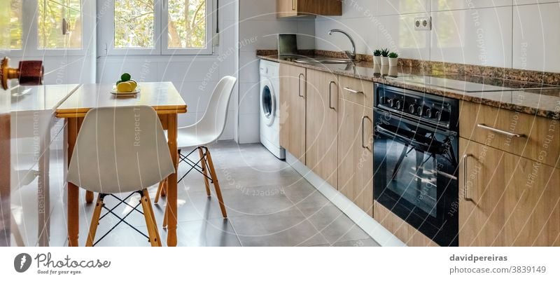 A Blue Kitchen With Stainless Steel Appliances Stock Photo - Download Image  Now - Kitchen, Cabinet, Modern - iStock