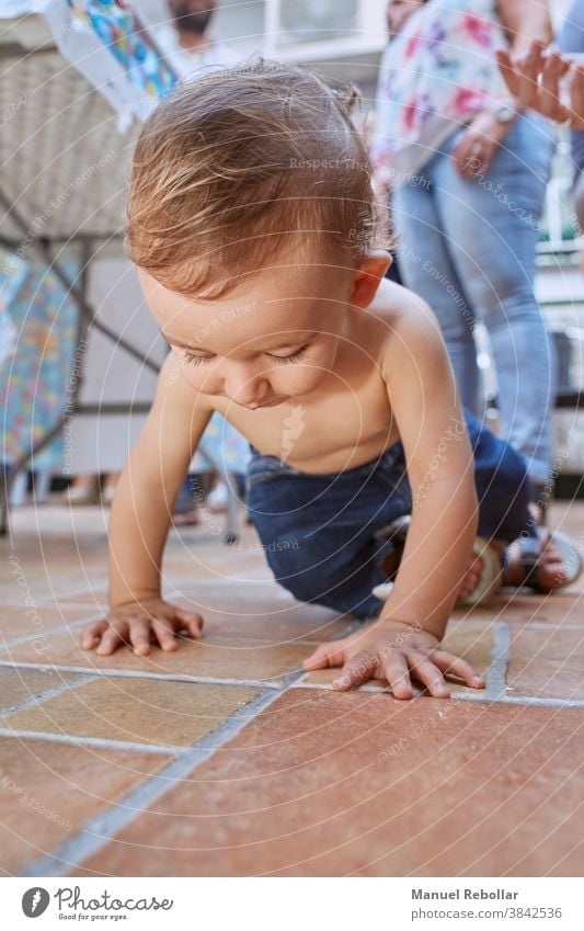 photograph of a crawling baby child kid happy cute childhood toddler boy adorable little beautiful care smiling caucasian infant healthy person girl funny