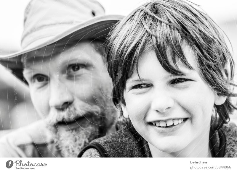 male friendship fortunate Smiling Black & white photo Happiness Happy Dreamily Face Facial hair Child Boy (child) Warm-heartedness Safety (feeling of) Son Love