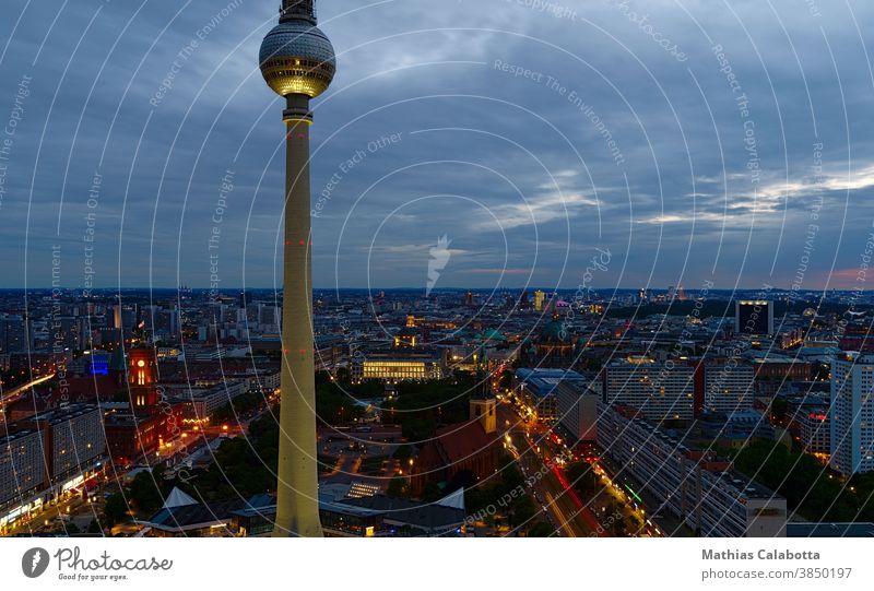 Berlin television tower photographed at sunset with long exposure Television tower Night Skyline Tower Alexanderplatz Building City Europe Germany Square
