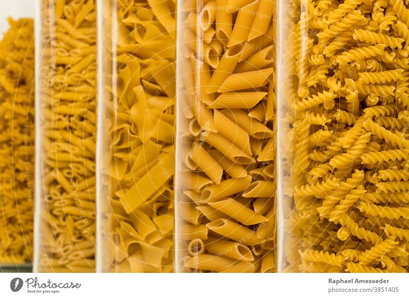 Noodle sorts filled in high glasses, studio shot assorted box calories carbohydrate closeup collection cook cooking cuisine culinary decorative delicious dough
