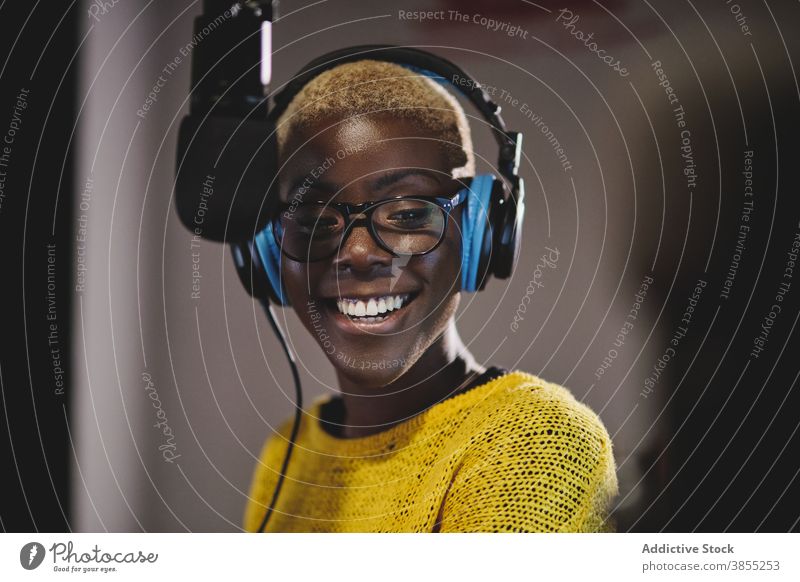 Black woman working at radio station - a Royalty Free Stock Photo from  Photocase