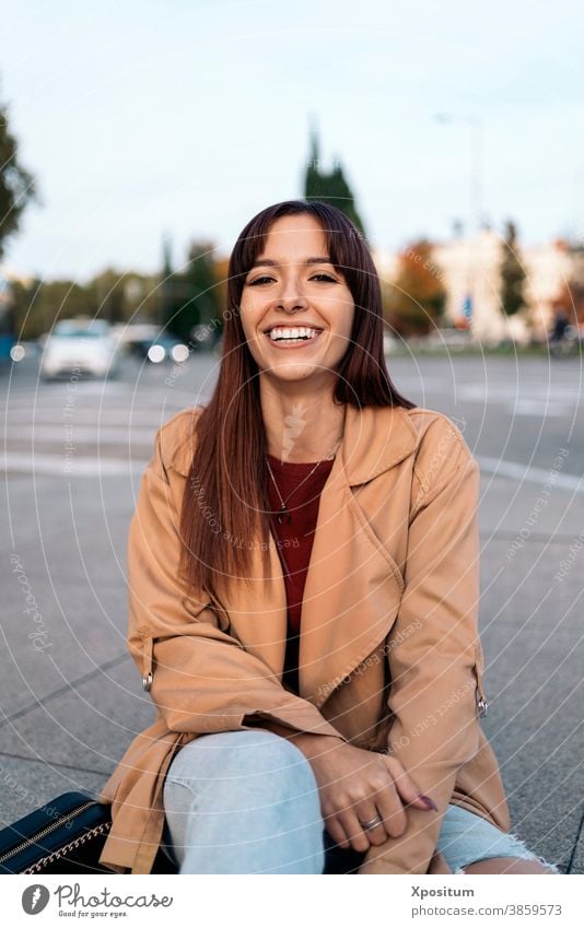 Young caucasian woman smiling looking at camera young street city madrid people happy urban portrait lifestyle travel beautiful fashion outdoors girl happiness