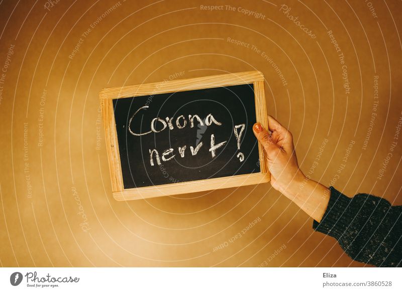 Corona Nervt is on a chalkboard corona annoys corona nerves School Chalkboard Exasperated Anger Frustration lockdown Measures Crisis rabid coronavirus