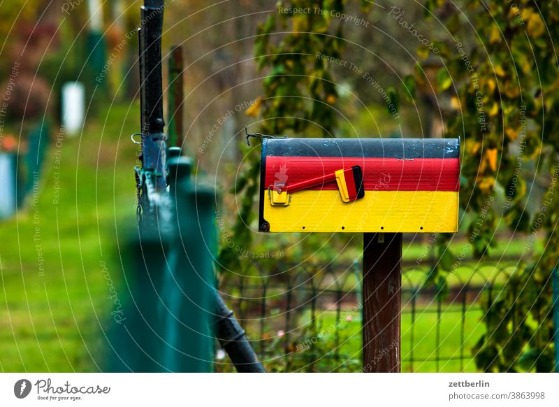 Mailbox for German letters Americas Germany Flag German flag nation national colors Patriotism patriotically National national emblem Garden allotment