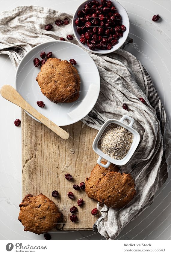 Sweet cookies with cranberries on table cranberry dessert bakery sweet homemade tasty arrangement dried pastry kitchen food baked wooden cutting board