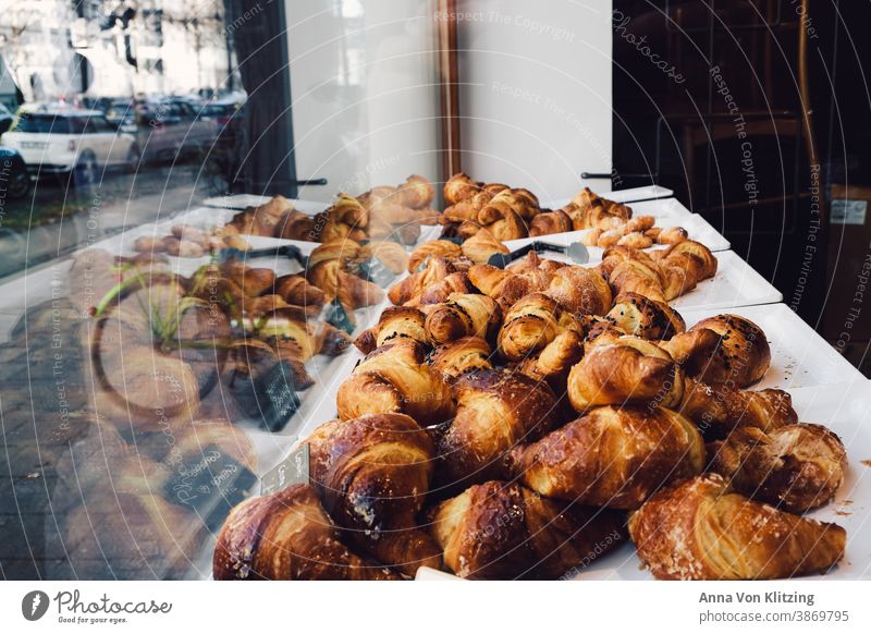Croissants in the shop window Shop window reflection Bicycle cars Slice Display French Café Italian Flaky pastry Crisp biscuits Delicious cute Food Bakery