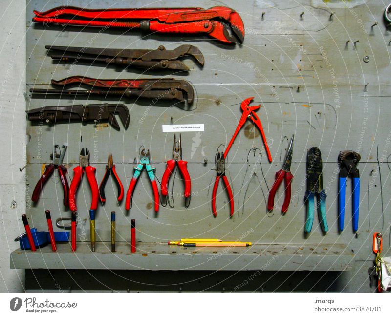 Tool Time Wall (building) Hang Workshop work Repair Pair of pliers Work and employment Craft (trade) Leisure and hobbies Workplace DIY
