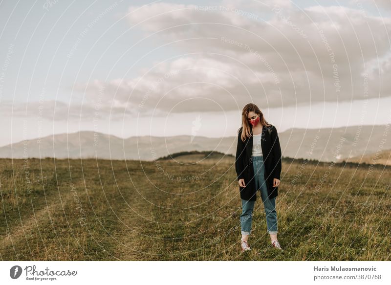 woman with mask outdoors in nature sad and depressed adventure attractive backpack bad mood beautiful beautiful landscapes beautiful woman beauty caucasian