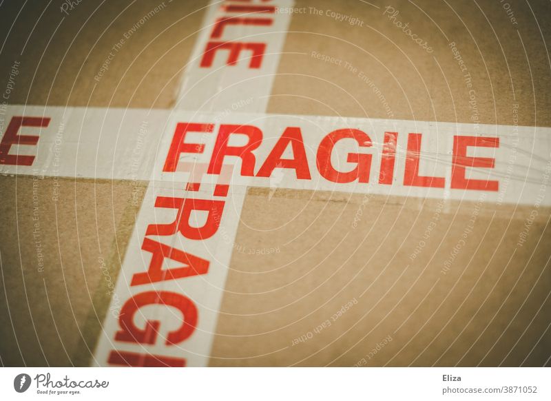 A package marked Fragile - fragile. Package Mail Caution Packaging Delivery Inscription Warn precious online shopping Mail order selling mail dispatch Logistics
