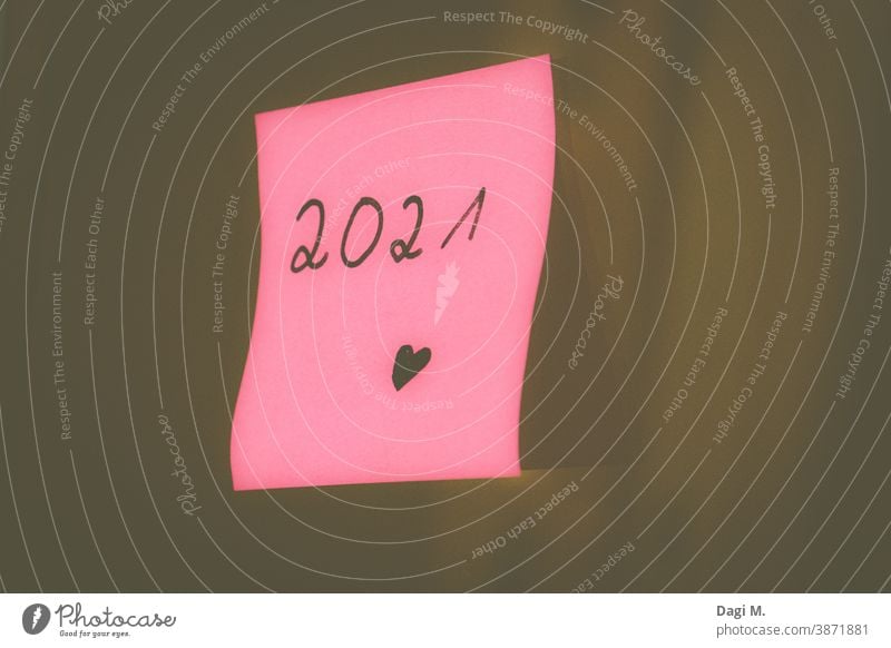 Year 2021 on pink Post-It, New Year, New Year's Eve, New Year turn of the year new year Cheers Future