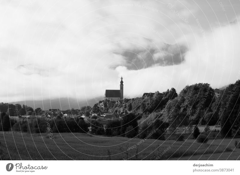 Idyllic Berchtesgartner Land. Houses, church, mountains and lots of clouds. Church Architecture Religion and faith Exterior shot Tourist Attraction Old town