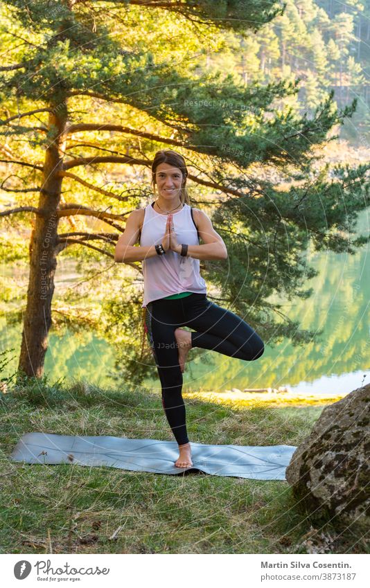 Attractive Woman in Yoga Pants and Top Sitting in Forest Taking Rest after  Trainings, Looking at Camera Stock Photo - Image of park, motivation:  185884408