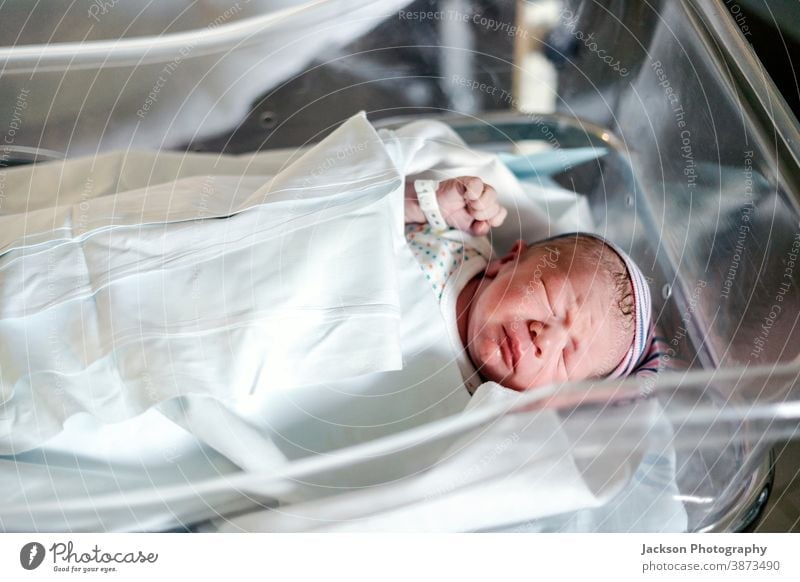 cute newborn baby boy in hospital