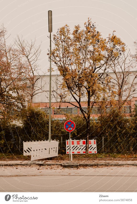 Forest of signs in the industrial area Industry Industrial area Parking Clearway Signs cordon trees Autumn minimalism Lantern Factory factory building Signage