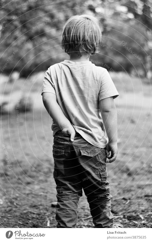 there's a slide.... Child Infancy Former upbringing Boy (child) Black & white photo Exterior shot 3 - 8 years medium-length hair Blonde Nature naturally Pants