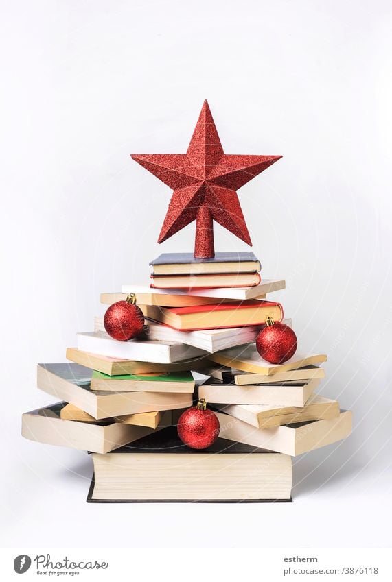 Christmas concept background. Books in the form of a christmas tree books christmas background read textbook know learn study bookstore reading christmas eve
