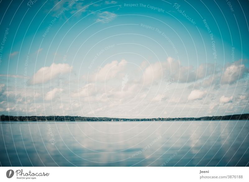 Reflection of sky and clouds in the water surface of a lake reflection Sky Clouds Water Lake Surface of water Horizon Blue White Calm Nature Landscape