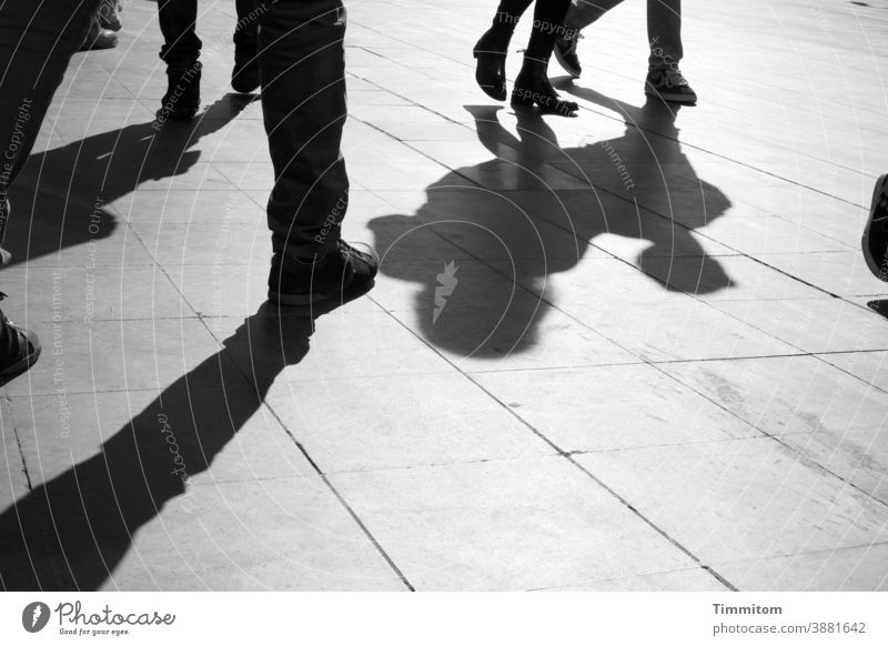 People and shadows on Roman square vacation people Legs Shadow Places Rome Footwear lines Black & white photo Tourism Italy Light