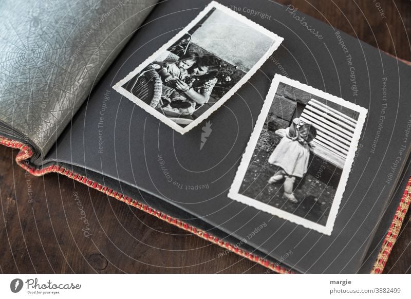 back to the roots | childhood Photography Analog Black & white photo family album Former Past Infancy preserve Memory Childhood memory look at Young woman