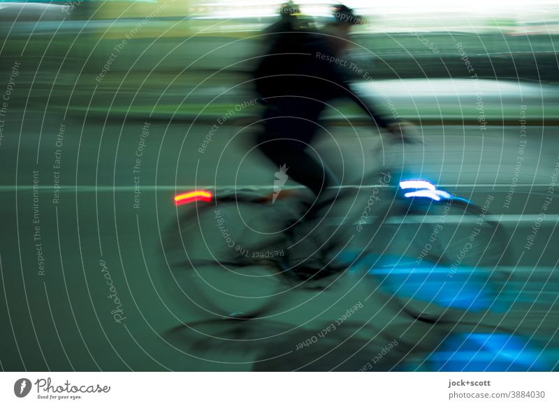 Headwind shapes your character Wheel Bicycle Cycling Means of transport Street Mobility Driving Traffic infrastructure Night Lighting motion blur Speed
