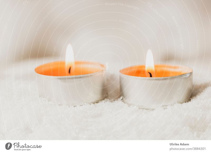 Two orange tea lights burning in the snow Tea warmer candle Tea lights candles Spa Snow Christmas Advent Wellness Flame Wick shoulder stand Christmas & Advent