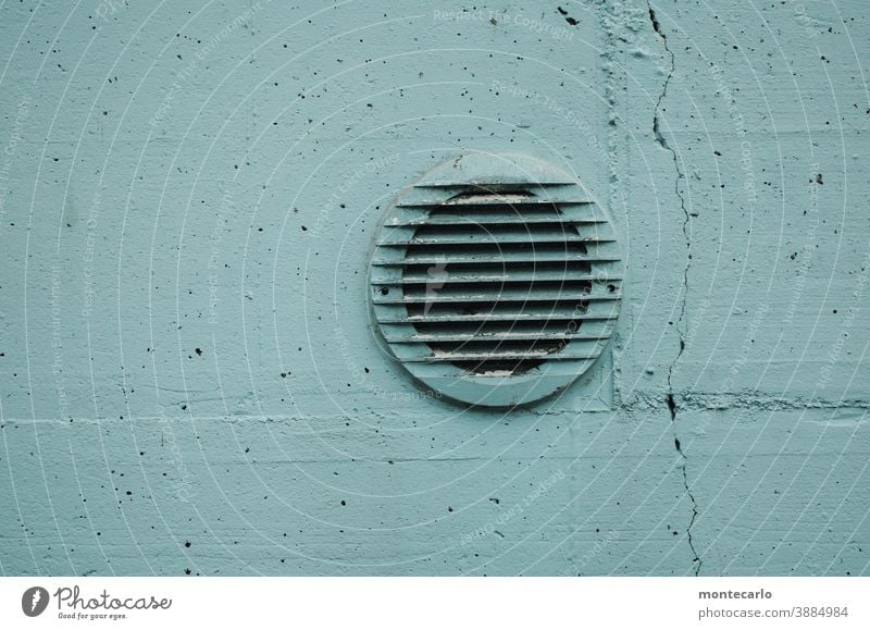 Exhaust cover in cracked light blue concrete wall Day Deserted Exterior shot Colour photo Ventilation Outlet air Simple Wall (building) Concrete Wall (barrier)