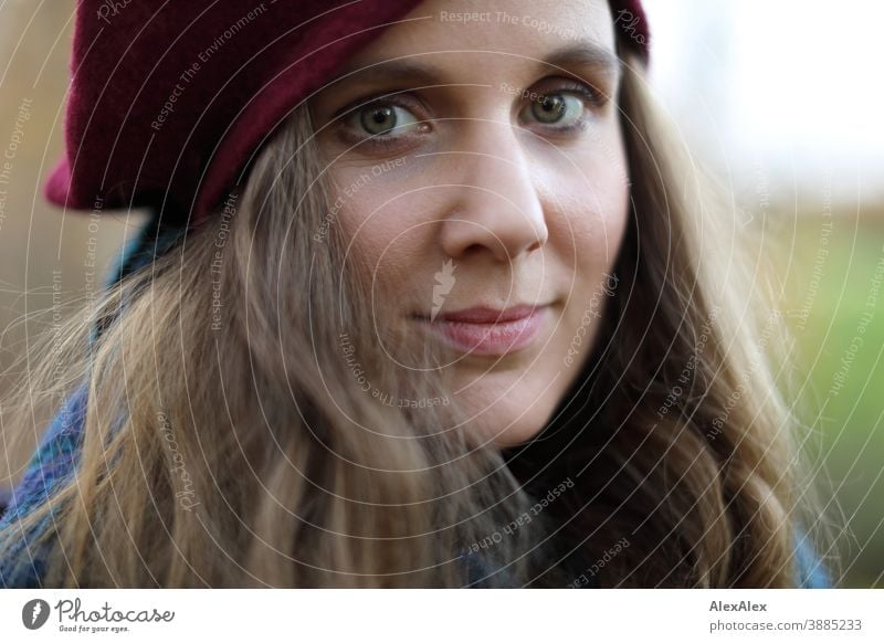 double exposure portrait of a young brunette woman smiling in both pictures  - a Royalty Free Stock Photo from Photocase