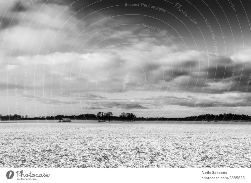 clouds over snowy winter field Background background material beautiful black copy space hill horizontal position landscape nature no people nobody outdoor