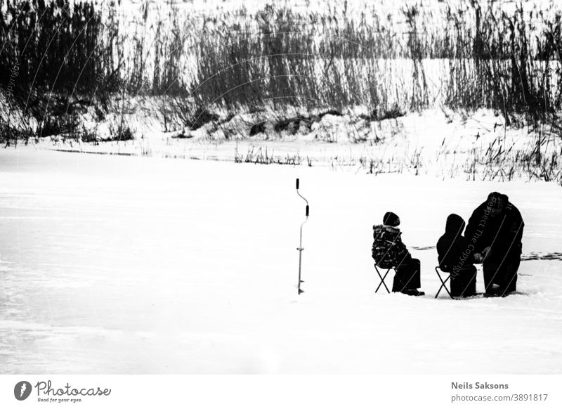 on frozen river. teaching children how to catch fish in winter. ice fishing black and white Ice Winter Cold Frost White Snow Tree learning father family