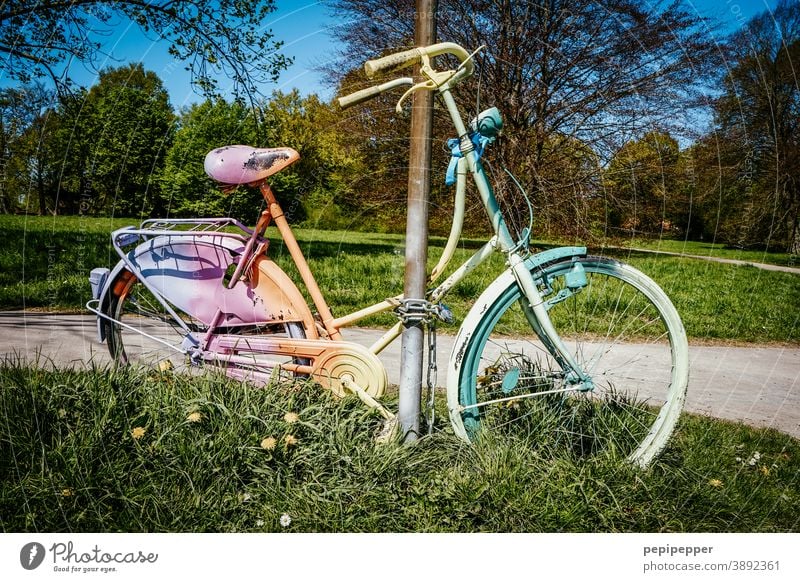 Rainbow bicycle chained Prismatic colors Rainbow Bicycle Rainbow flag rainbow flag Colour photo Vacation & Travel Homosexual Equality equal rights