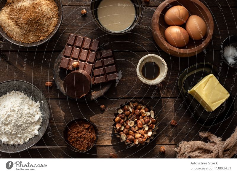Ingredients for pastry recipe with chocolate and hazelnuts ingredient sweet various set food prepare bake cuisine culinary butter egg cocoa flour assorted