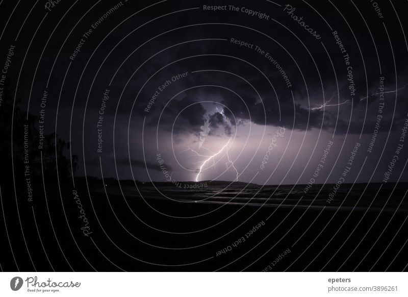 Weather Lights over the sea in Australia Weather Lighting lightning bolt Thunder Thunder and lightning Ocean lightning over the sea Queensland Dark Night Impact