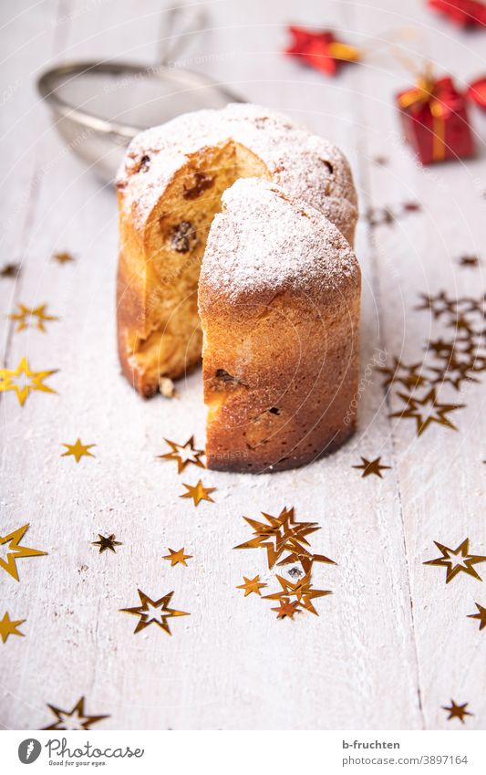 Small Panettone, Italian cake with Christmas decoration Cake Confectioner`s sugar Baked goods cute Delicious Baking Candy Christmas & Advent Christmas biscuit