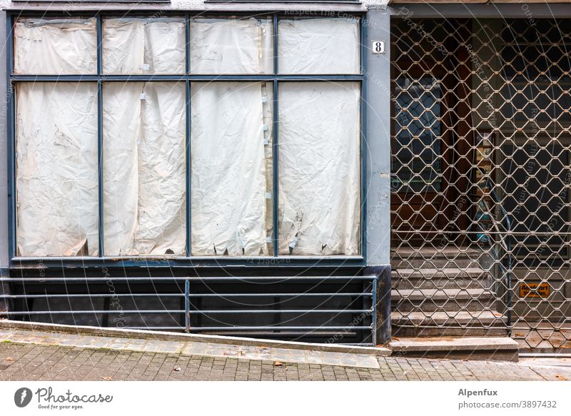 Closed forever Sign of a shop which had to close due to the